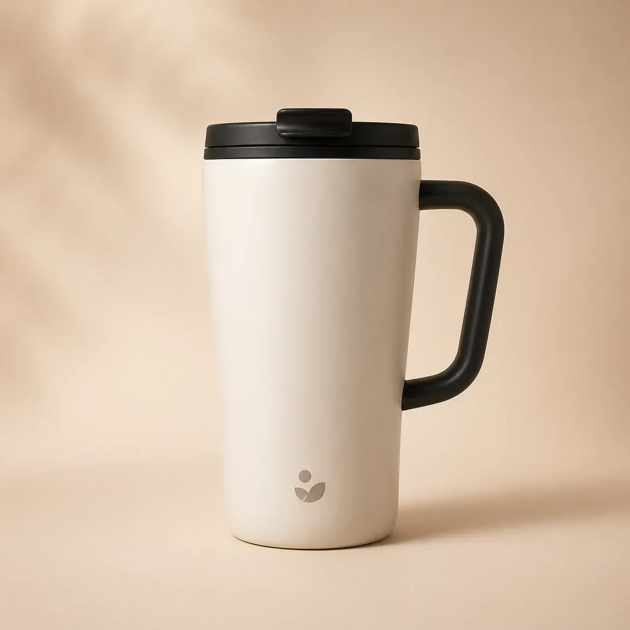 Edited ecommerce result showing the same travel mug centered on a warm neutral studio background.