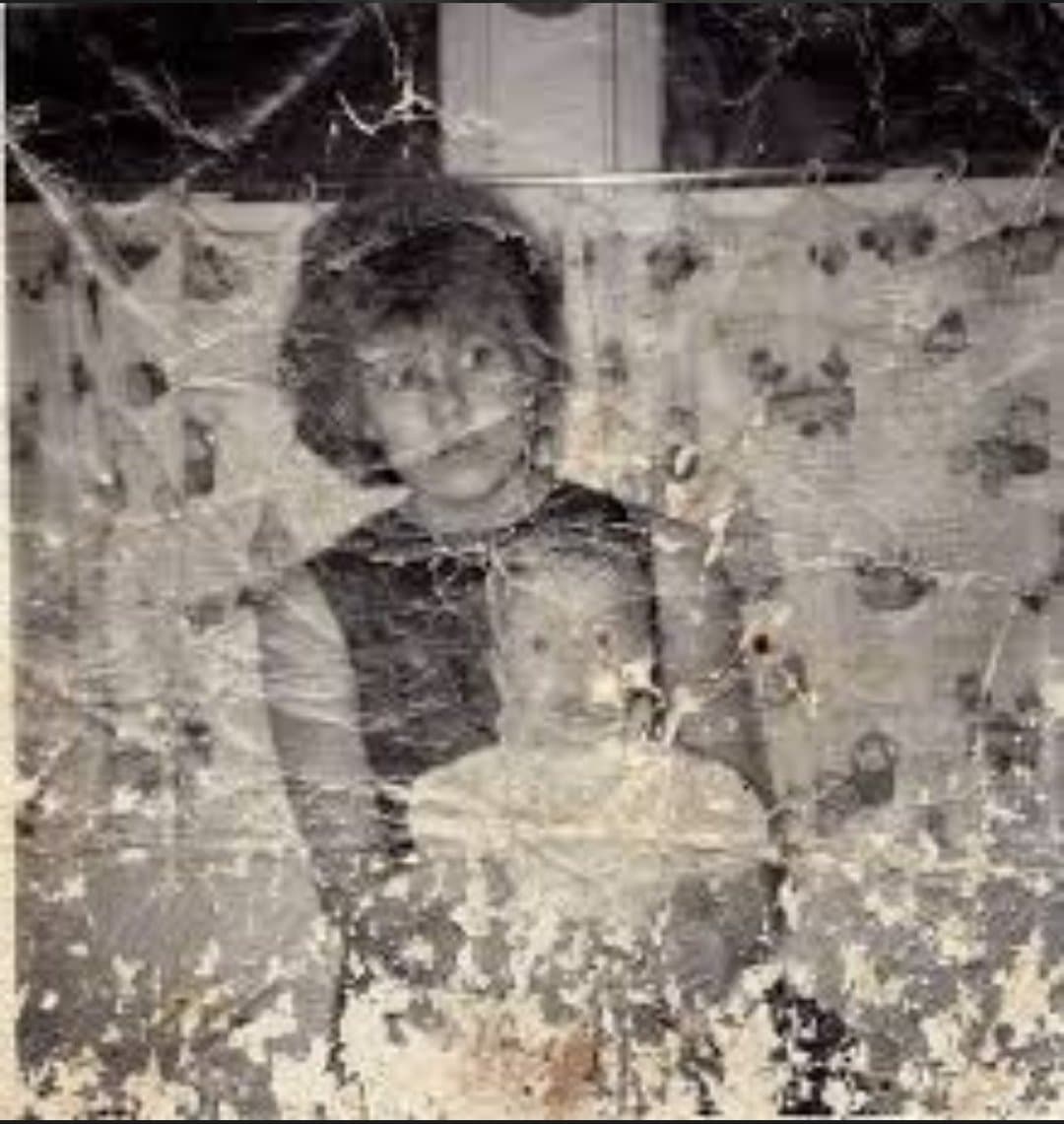 Damaged Vintage Mother and Child Photo generated image example
